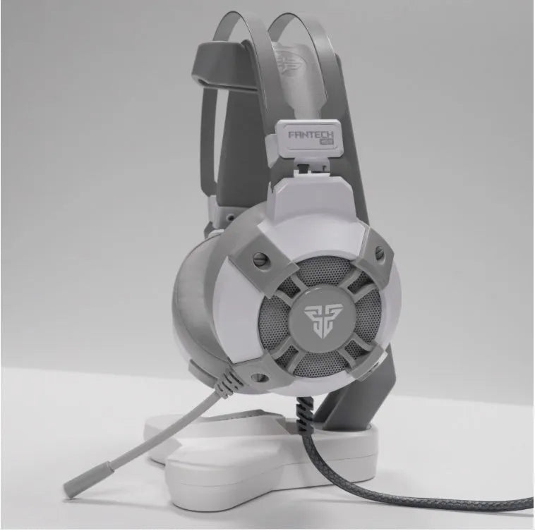 Black FANTECH HG11 gaming headset with RGB lights, large ear cups, and a noise-cancelling microphone on a flexible boom.