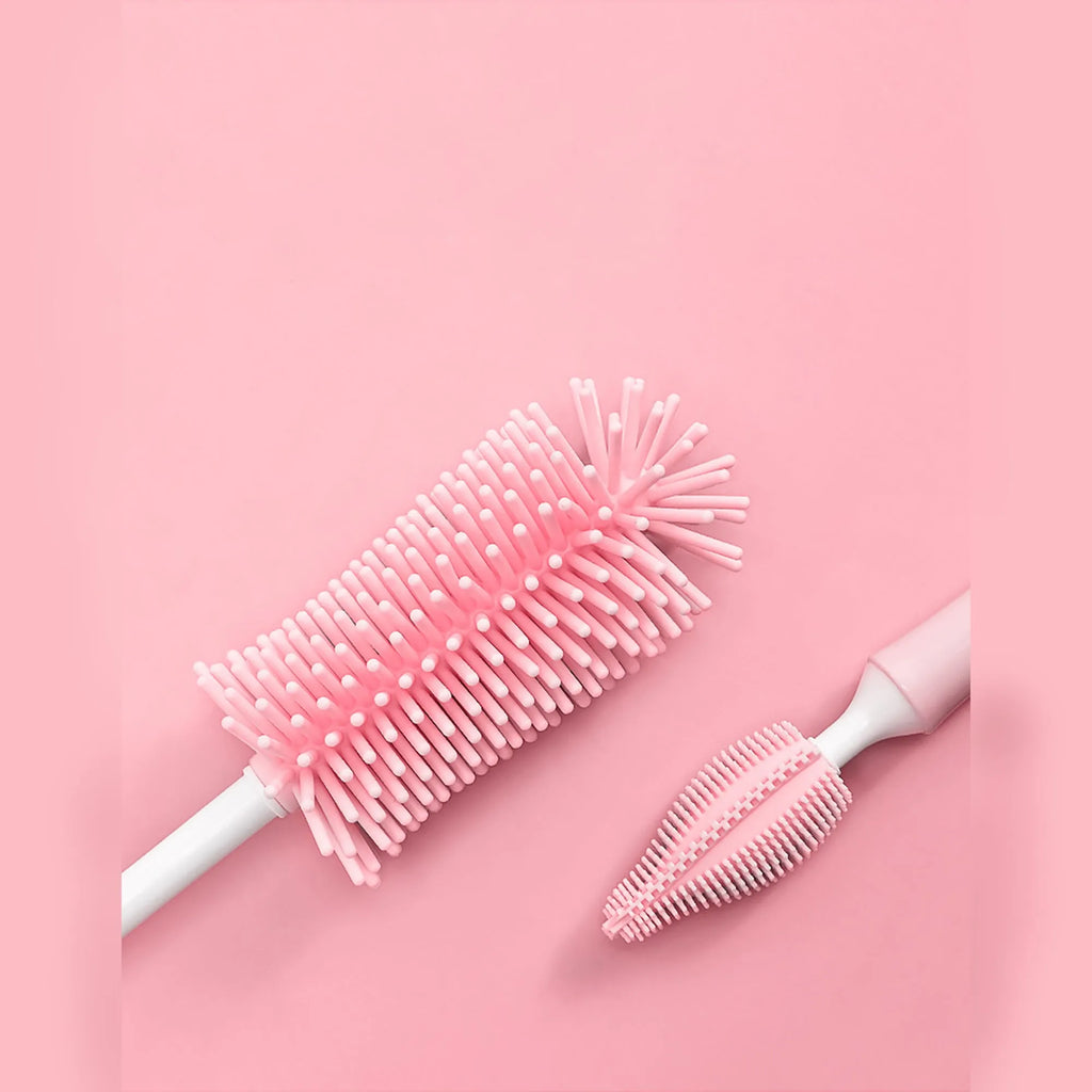 Silicone baby bottle brush with straw cleaning head in pink, blue or yellow colours