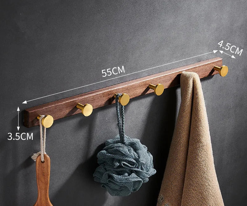 Black walnut aluminium bathroom clothes hooks with brass wire drawing accents on perforated mounting plate