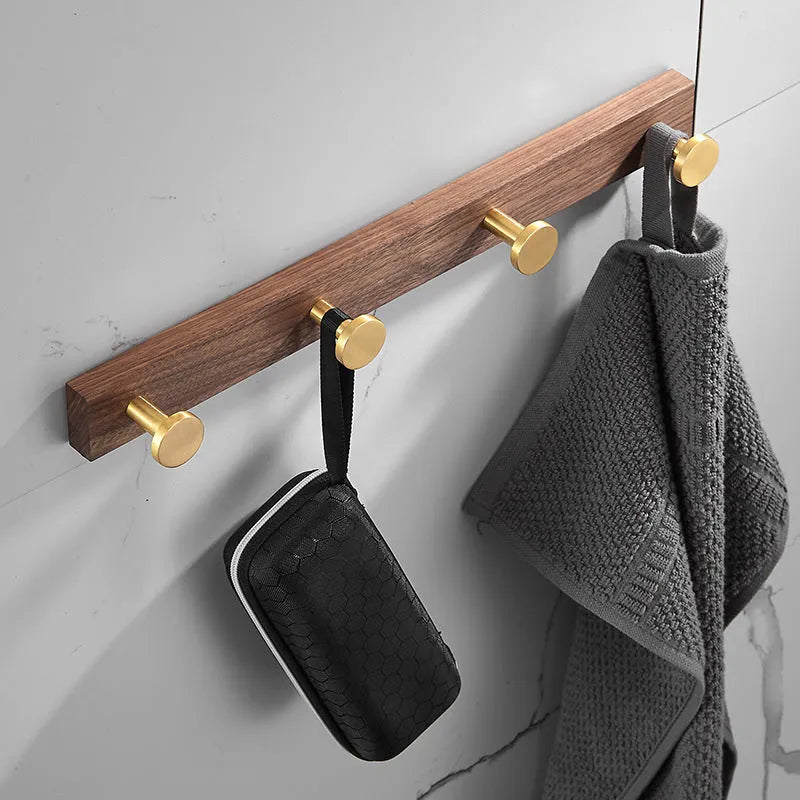 Black walnut aluminium bathroom clothes hooks with brass wire drawing accents on perforated mounting plate