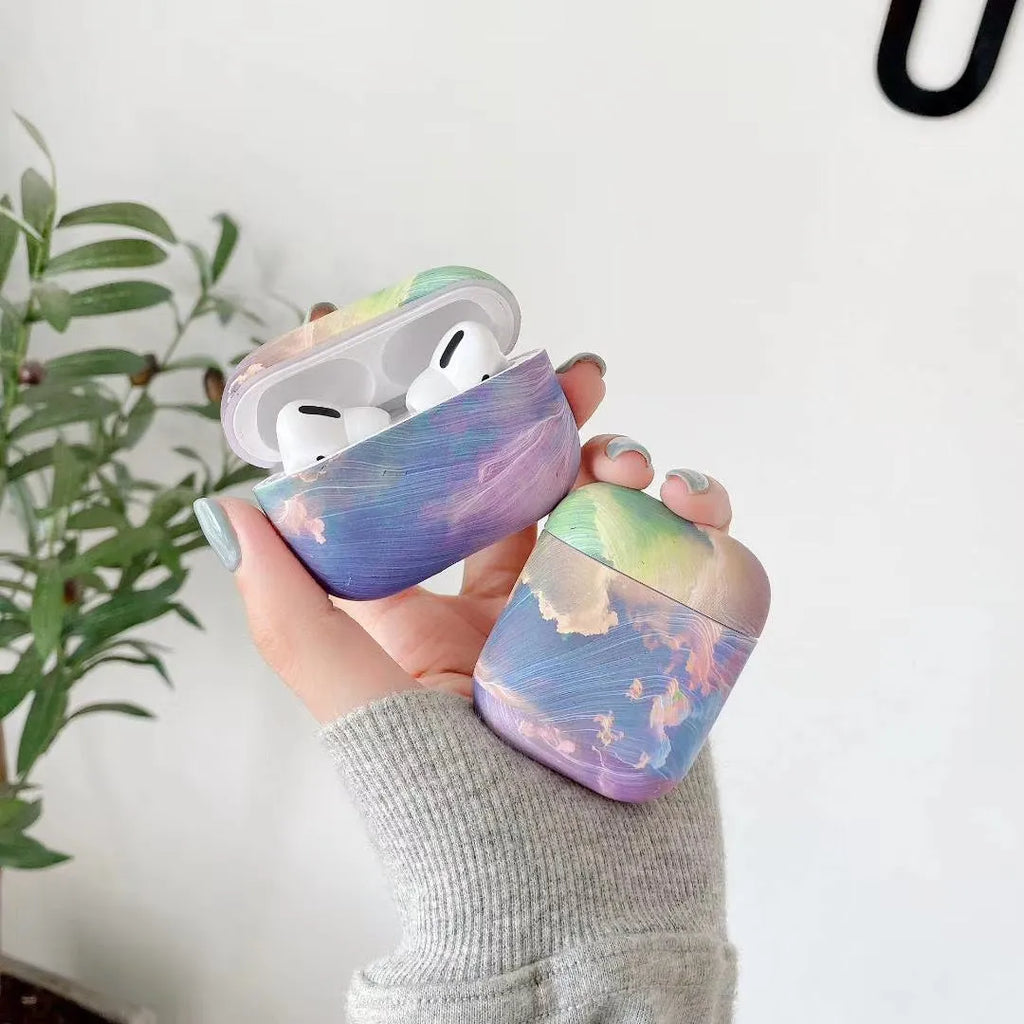 Hard plastic protective case for AirPods Pro with watercolour design in blue colour
