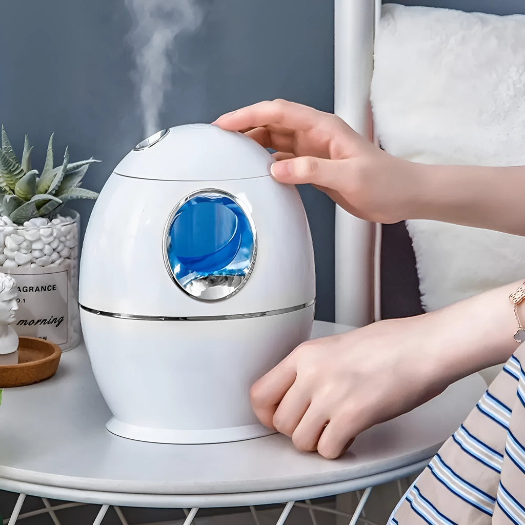 White round silent USB aromatherapy spray humidifier with 800ml water tank.