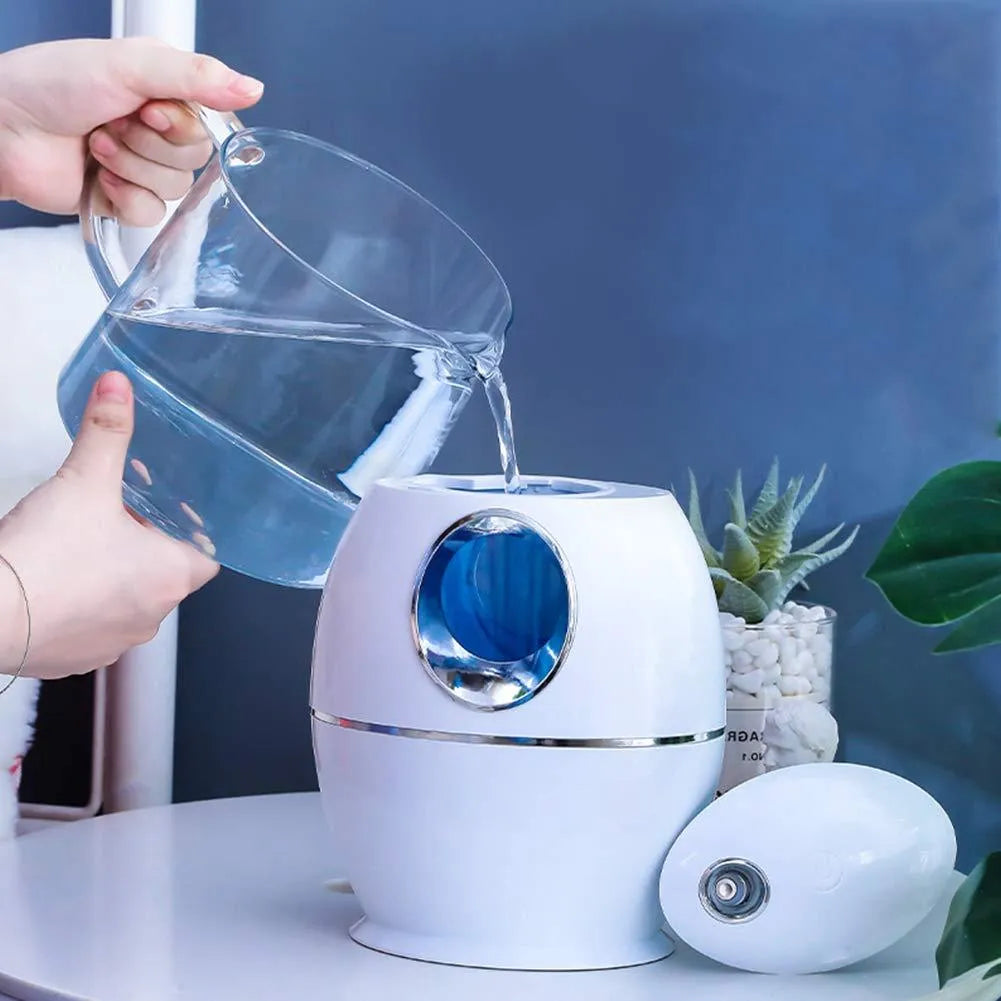 White round silent USB aromatherapy spray humidifier with 800ml water tank.