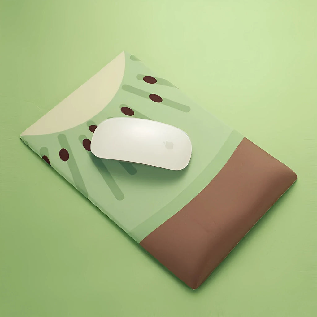 Green kiwi fruit design mouse pad with thickened wrist support on office desk