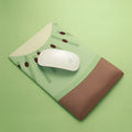 Green kiwi fruit design mouse pad with thickened wrist support on office desk