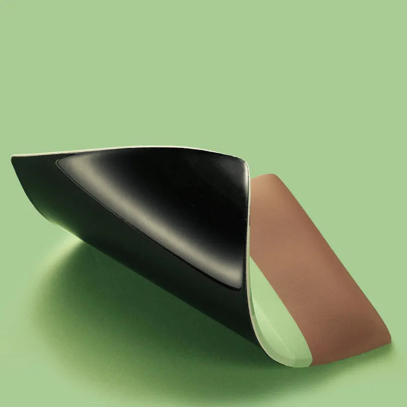 Green kiwi fruit design mouse pad with thickened wrist support on office desk