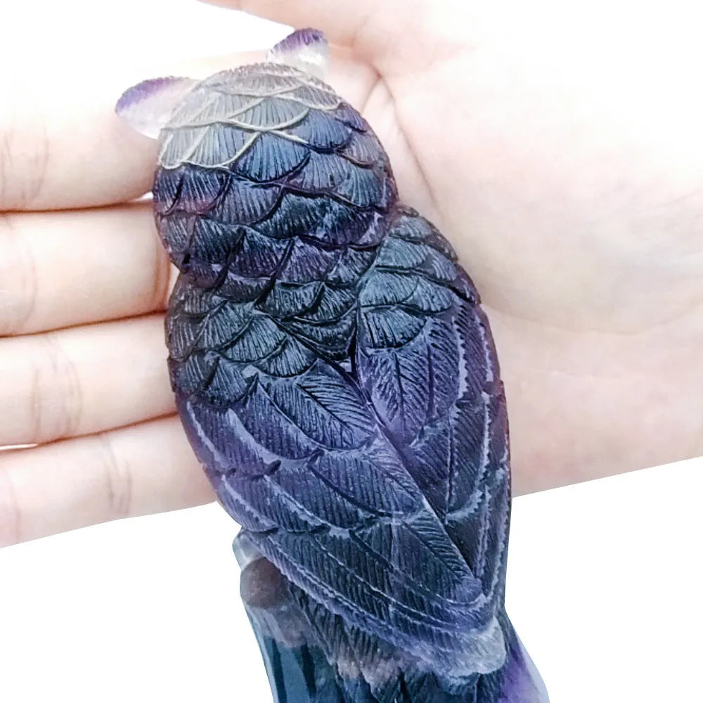 Daxiao hand carved purple fluorite owl ornament on a stand, approx 4 inches tall.