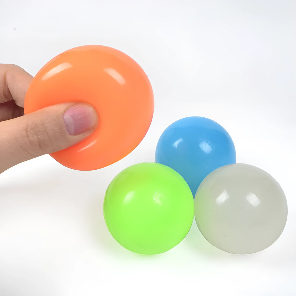 4.5cm TPR sticky ceiling ball in random solid colour with fluorescent finish, in OPP bag