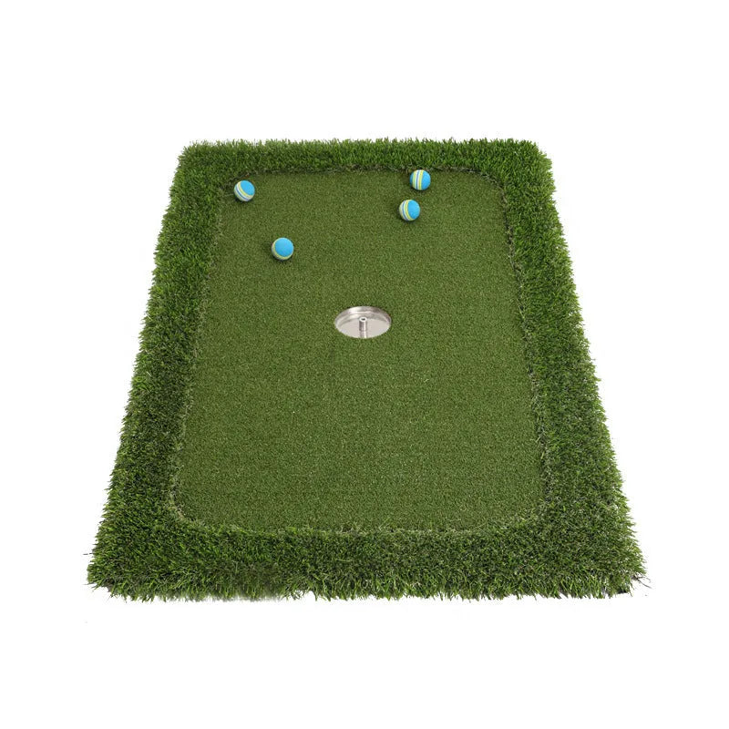 Green rectangular golf practice mat with a textured grass-like surface on a cushioned base.