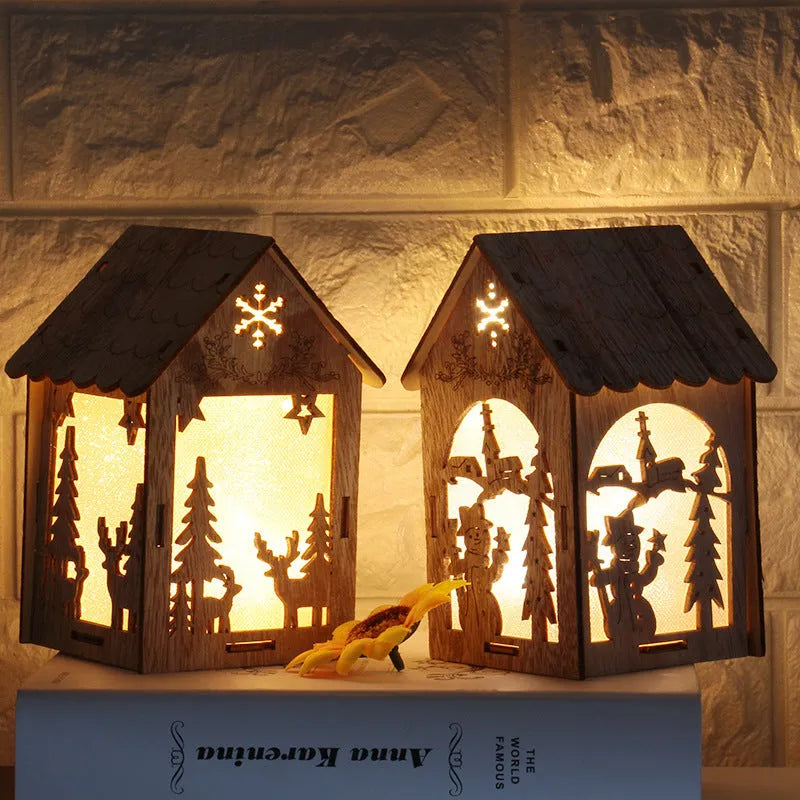 Three wooden Christmas decorations: small log bell, wooden house Santa, and wooden house snowman in natural wood colour