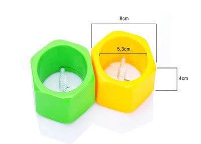 Yellow and green plastic spiral vegetable cutter for cucumbers measuring 8cm diameter