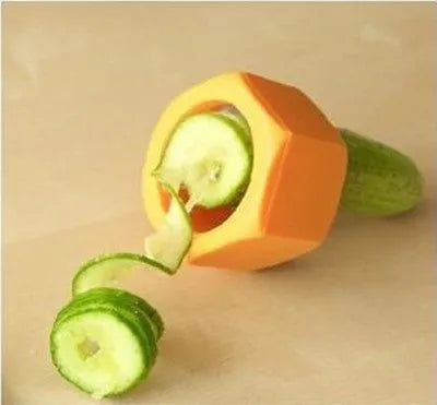 Yellow and green plastic spiral vegetable cutter for cucumbers measuring 8cm diameter