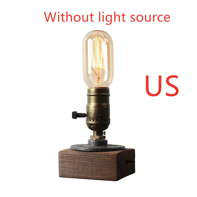 Water pipe design table lamp with wood and iron construction measuring 9 cm wide by 13 cm high