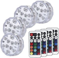 White waterproof LED pool light with remote control on a table
