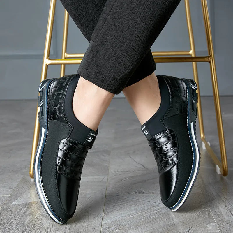 Men's blue casual low-top leather shoes shown on a white background, highlighting the wide size range.