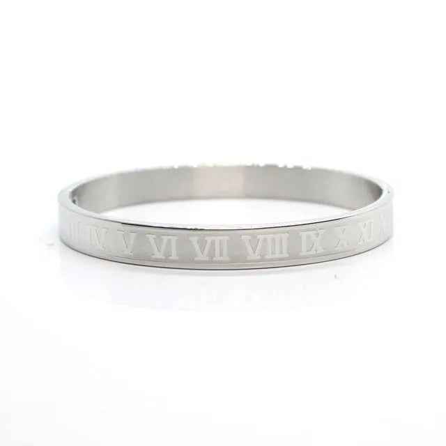 316L stainless steel bangle bracelet in silver finish with smooth surface on neutral background