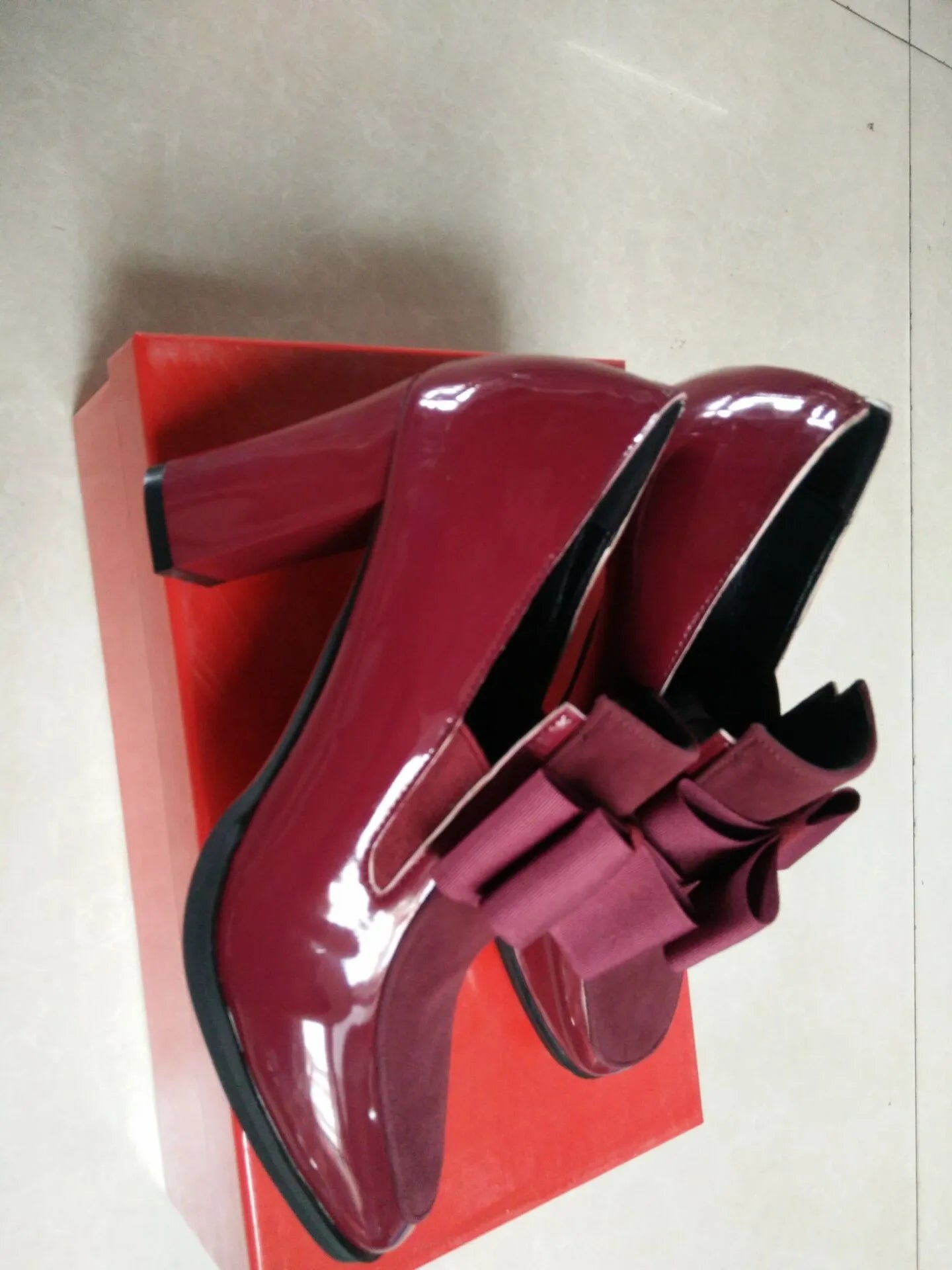 Women's black patent leather high heel shoes with thick heel and square toe design