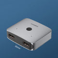 Grey HDMI one to two splitter switcher device with 4K support for computer TV monitors