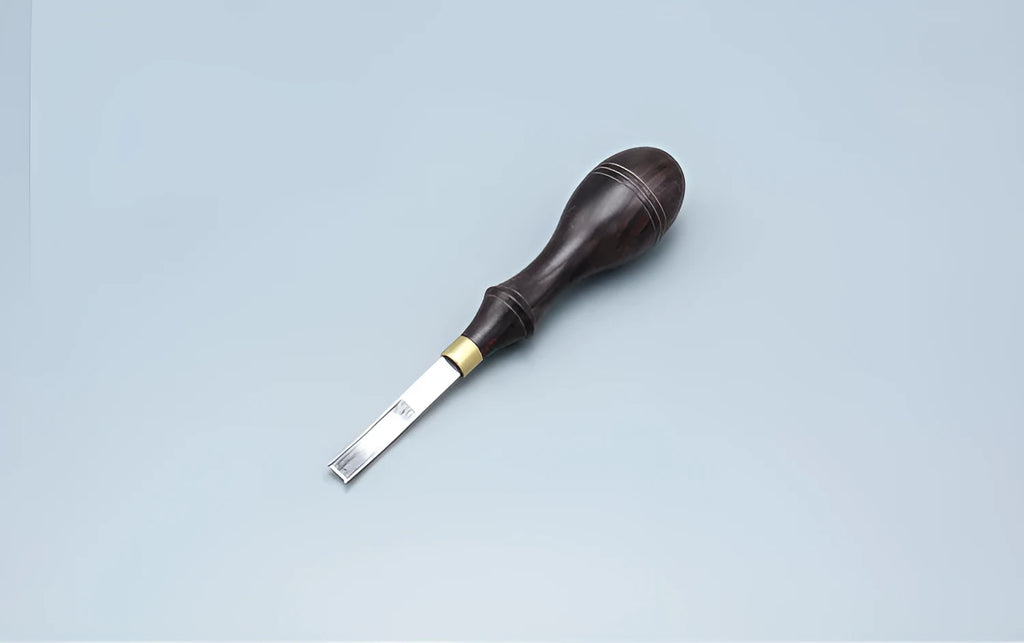 Shovel edge thinning knife with sectional cutting drum and leather handle.
