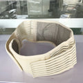 Beige self-heating magnetic waist support belt for lumbar muscle strain on a neutral background.
