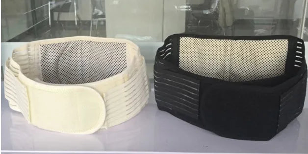 Beige self-heating magnetic waist support belt for lumbar muscle strain on a neutral background.
