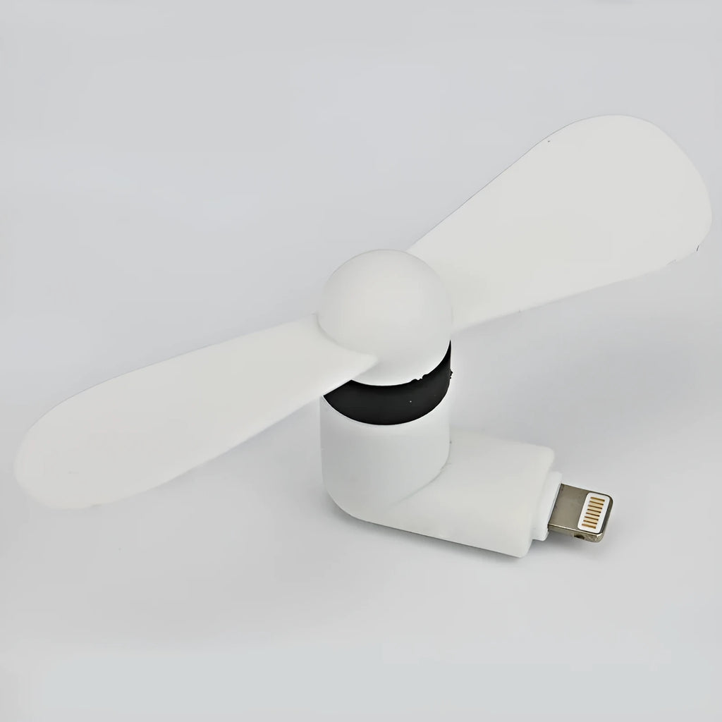White USB-powered mini personal fan with round plastic blades and a rotary switch, shown next to a mobile phone.
