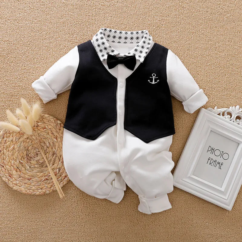 Baby boy in a long-sleeved cotton jumpsuit, navy blue gentleman style, for spring or autumn.