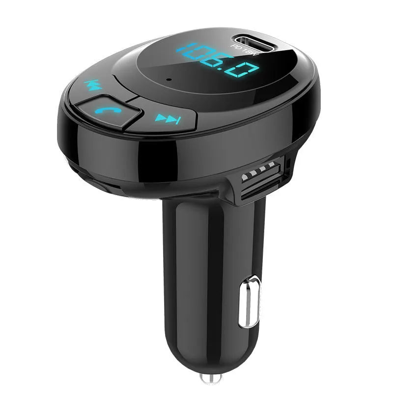 Black car Bluetooth MP3 charger with digital display and dual USB ports plugged into cigarette lighter