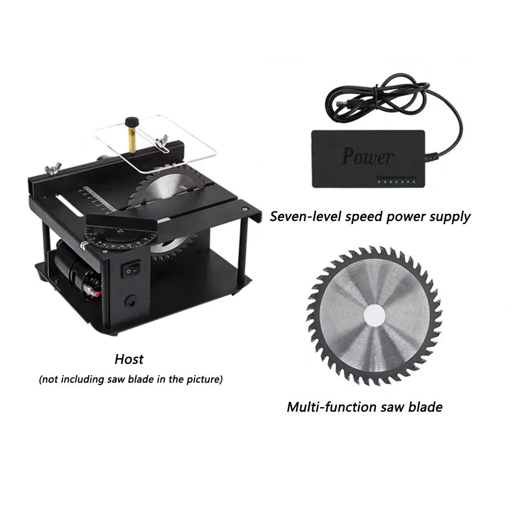Black miniature precision table saw with sliding table and 110mm blade on a workbench.