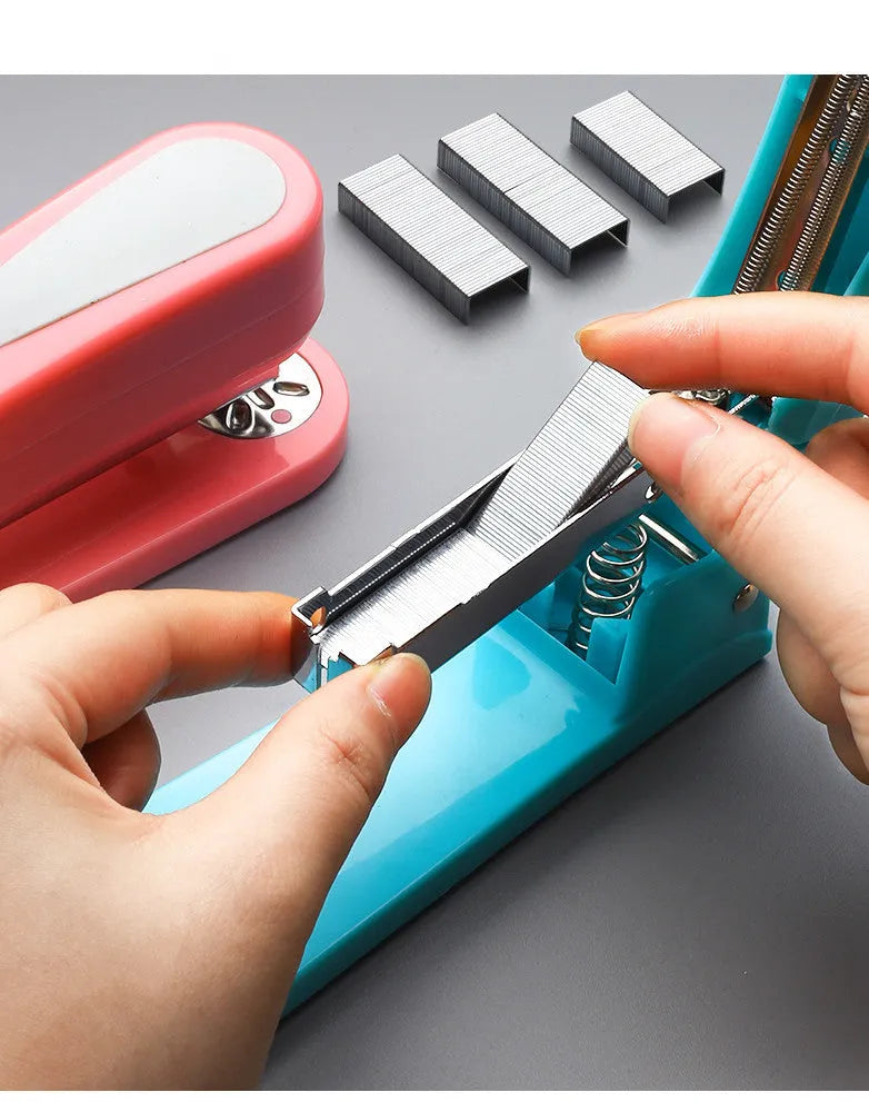 360-degree rotatable desktop stapler in colour options showing rotating head and paper feed