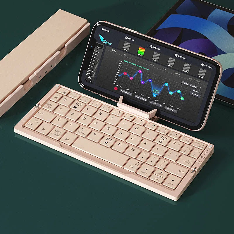 Aluminium folding Bluetooth keyboard in silver white colour showing open typing position and compact folded size