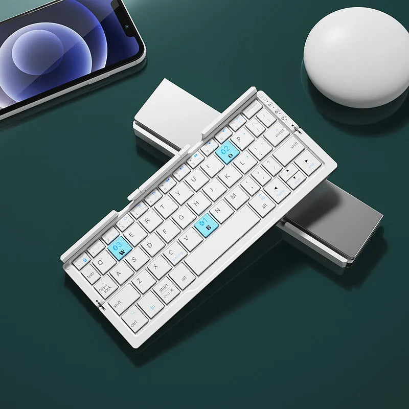 Aluminium folding Bluetooth keyboard in silver white colour showing open typing position and compact folded size