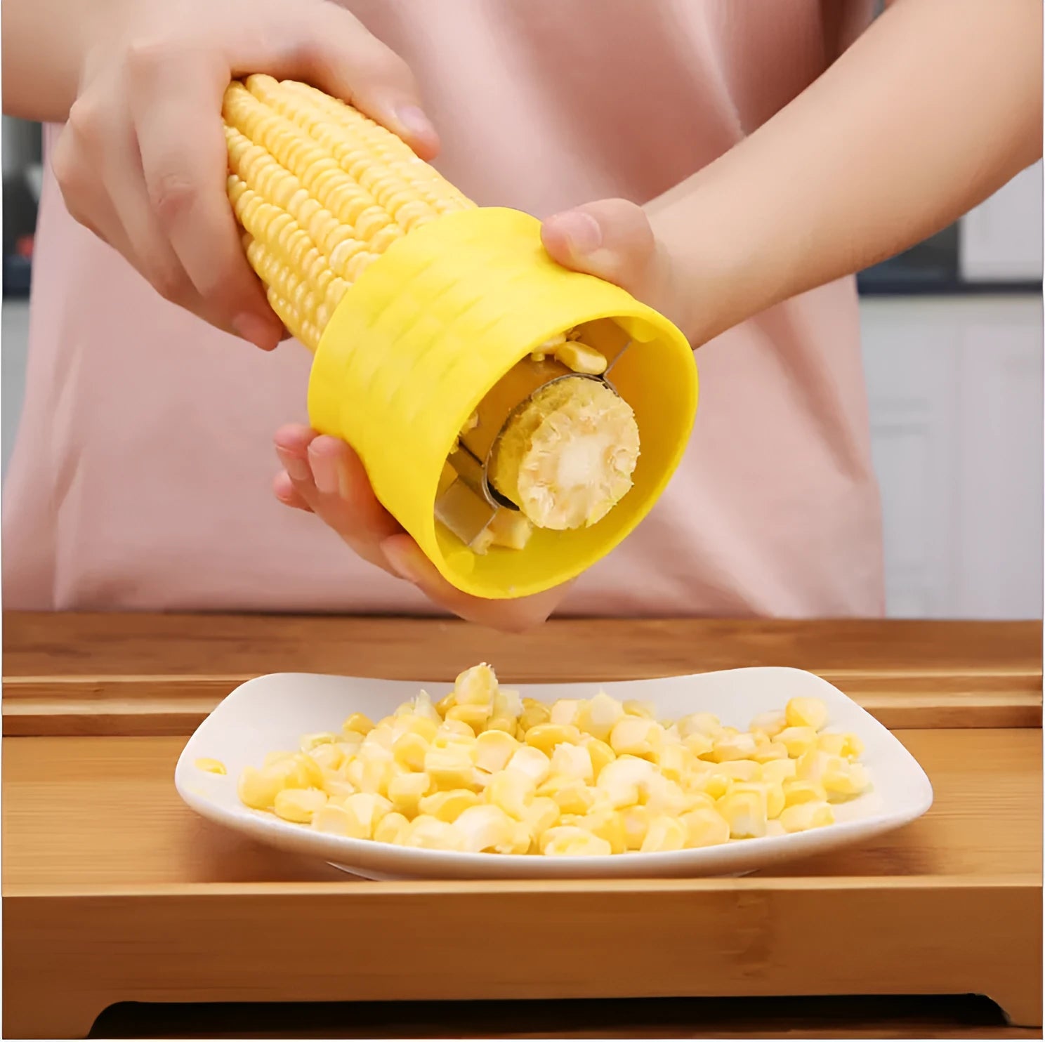 Yellow manual corn grinder thresher with PP grip and stainless steel gear for peeling corn kernels.