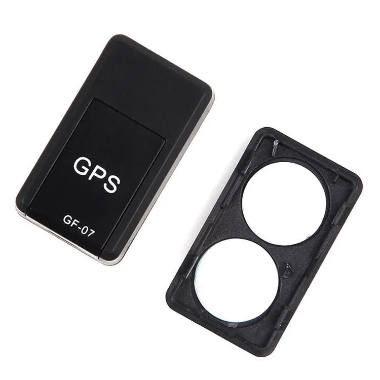 Black magnetic GPS car tracker device with compact rectangular design and USB charging port