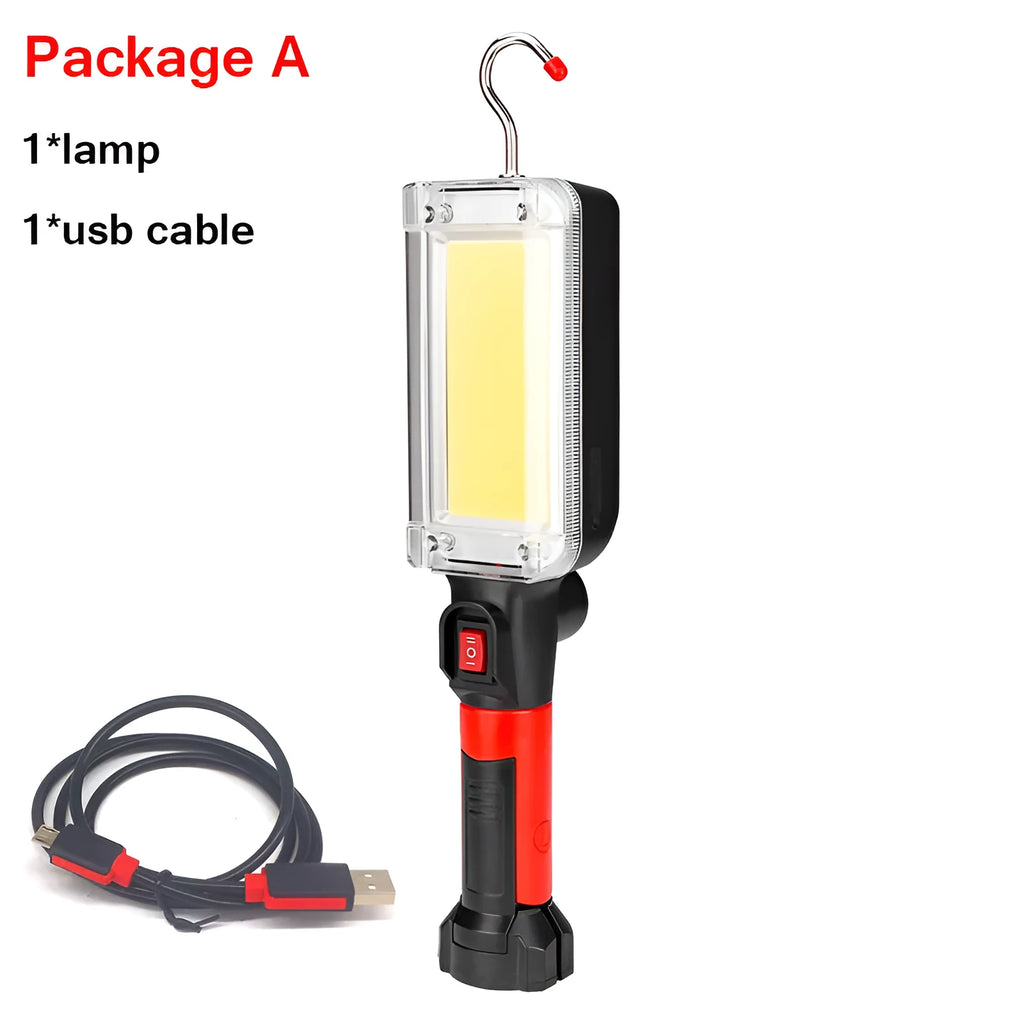 Red portable COB LED flashlight with USB cable and magnetic hook on metal surface