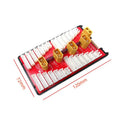 Red parallel charging board with four sets of T plug and balance ports for lithium batteries.