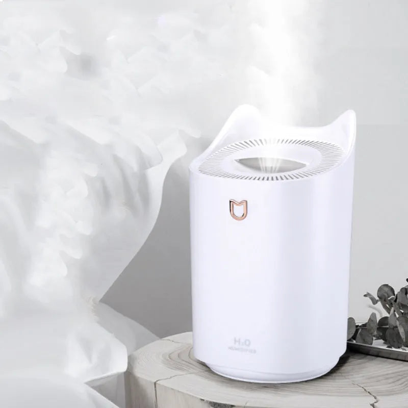 Double spray humidifier with three mist outlets in coral pink colour with USB cable