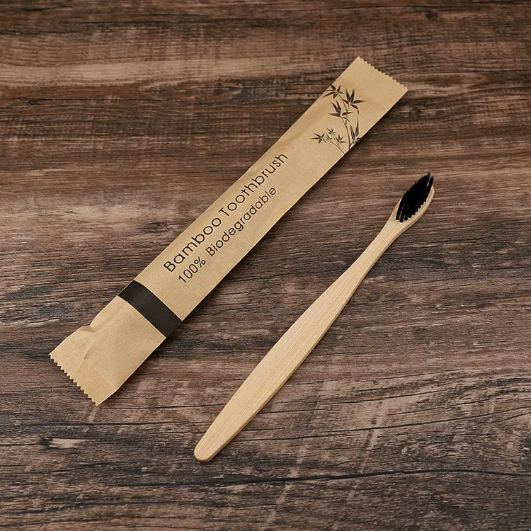 Ten natural bamboo toothbrushes with soft bristles in assorted colours including white, yellow, purple, grey, green and black.