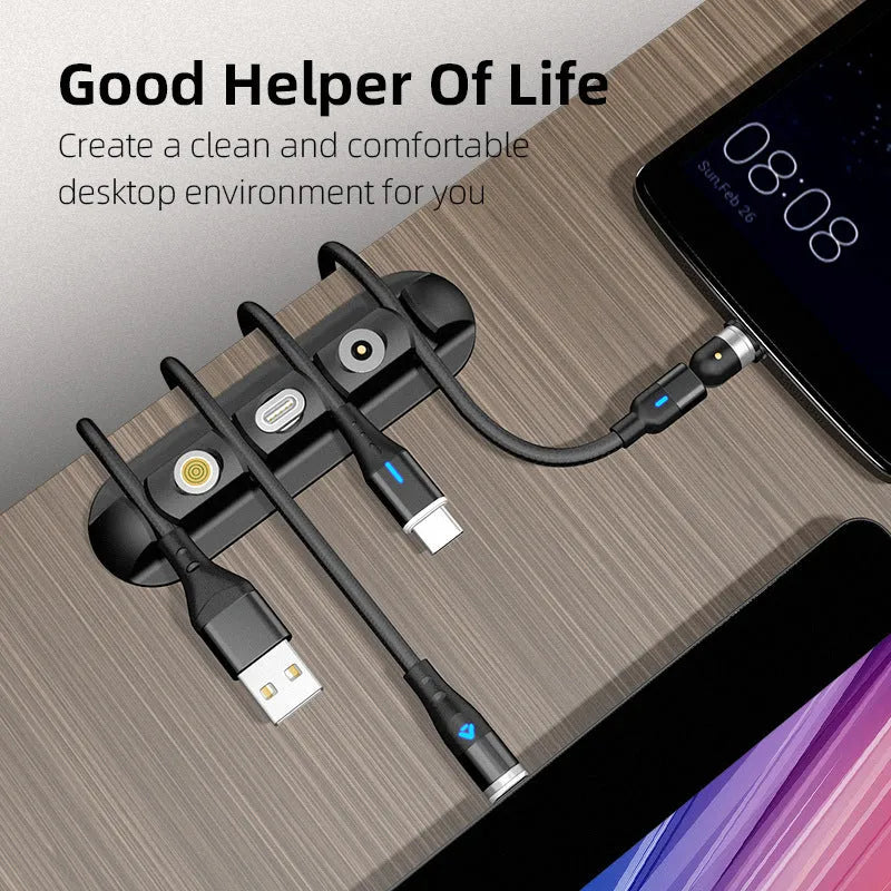 Black soft plastic desktop charging base stand with magnetic data cable organizer.