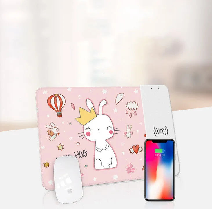 Wireless charging mouse pad with cartoon design and illuminated RGB lighting on desk