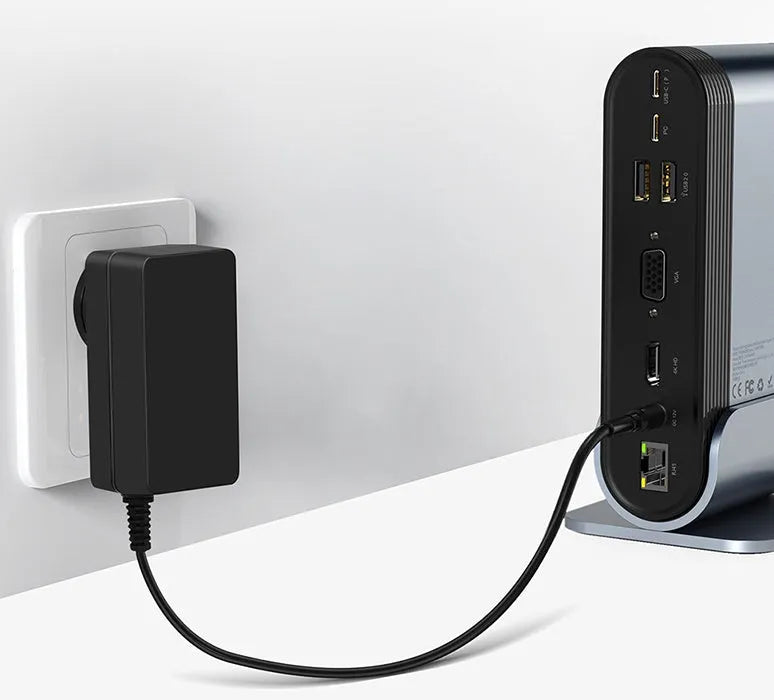 Deep space grey 16-in-1 Type-C docking station hub with multiple ports and optional power adapters on a desk.