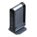 Deep space grey 16-in-1 Type-C docking station hub with multiple ports and optional power adapters on a desk.