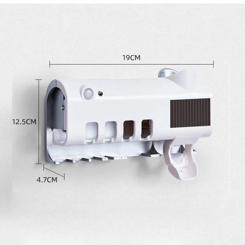 White intelligent wall-mounted UV toothbrush steriliser with automatic toothpaste squeezer unit.