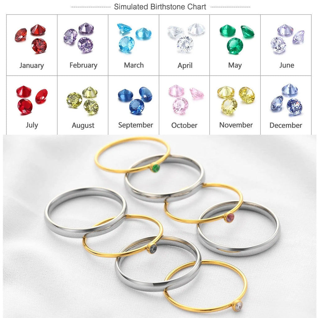Geometric titanium steel ring with December birthstone colour and engraved superimposed design.