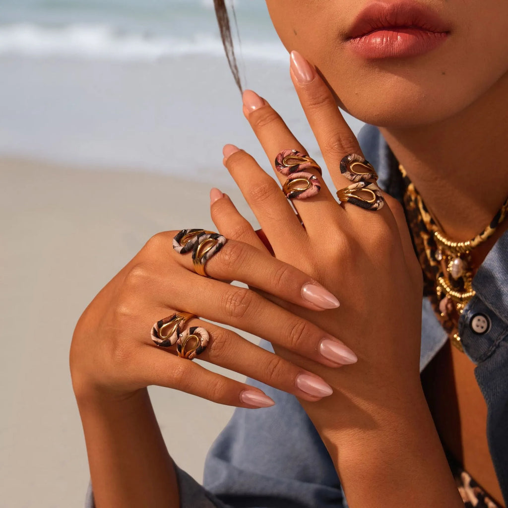 Leopard Series open mouth ring showing geometric asymmetric design with leopard print pattern on stainless steel