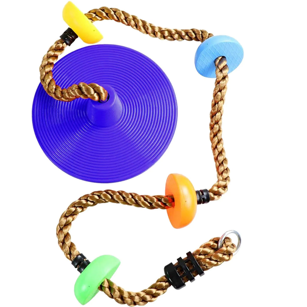 Plastic children's swing set with four colourful platforms on a climbing rope in a backyard