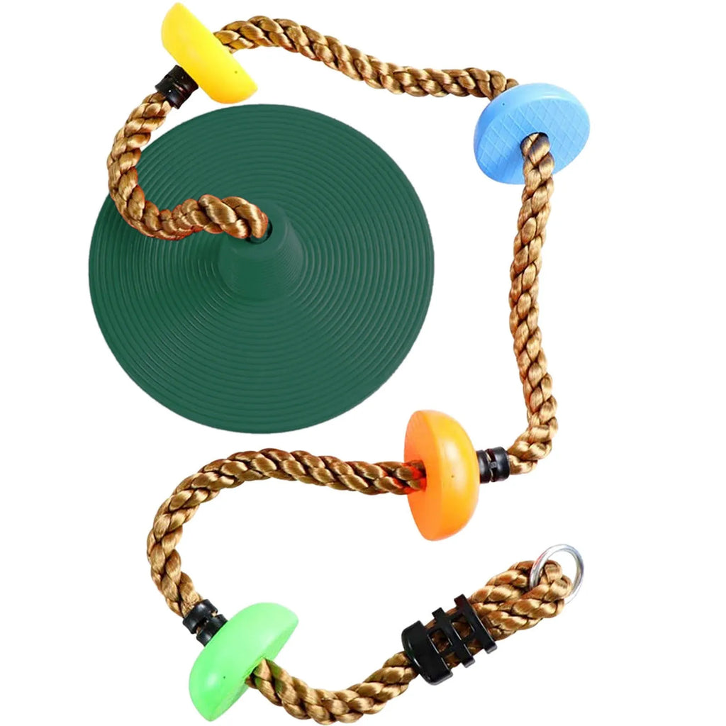 Plastic children's swing set with four colourful platforms on a climbing rope in a backyard