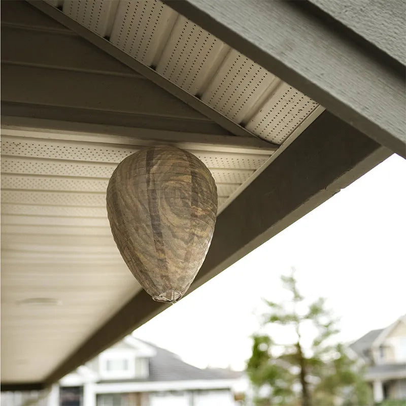 Paper and wire beehive lantern with honeycomb structure, 22 cm wide by 28 cm high.