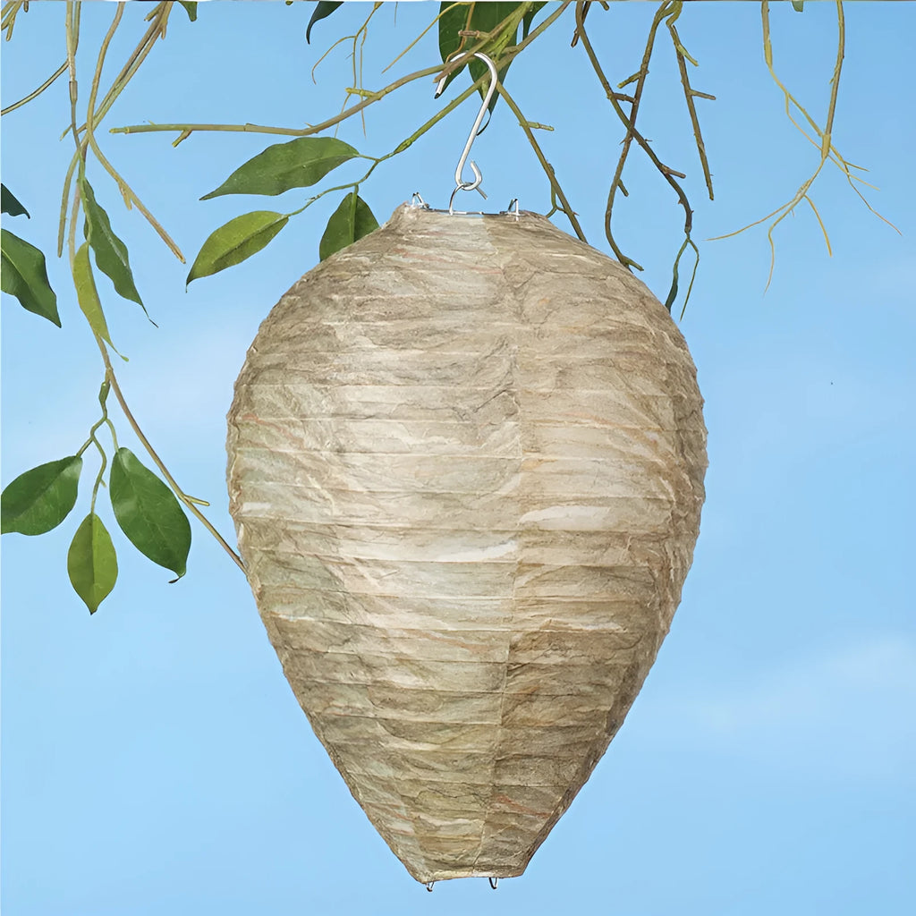 Paper and wire beehive lantern with honeycomb structure, 22 cm wide by 28 cm high.