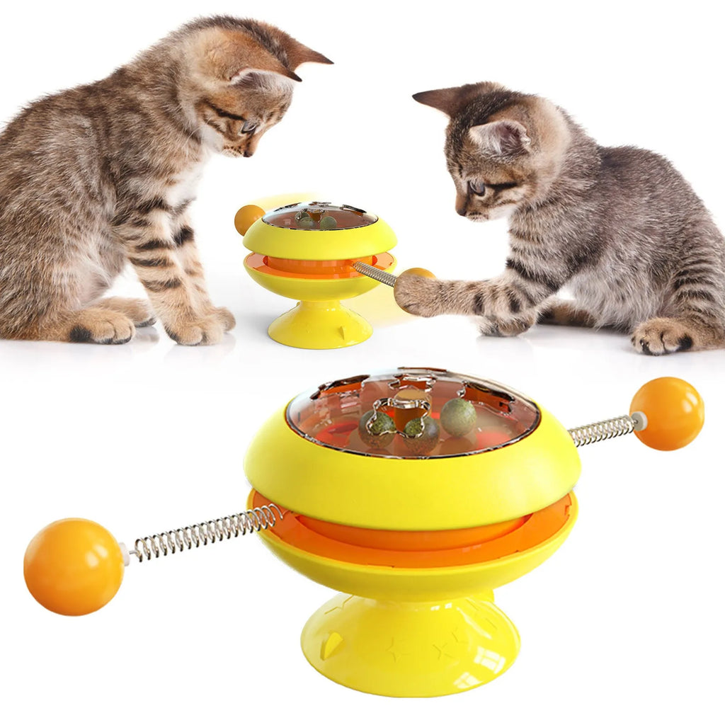 Rotatable plastic cat toy with turntable and catnip balls in a choice of colours.